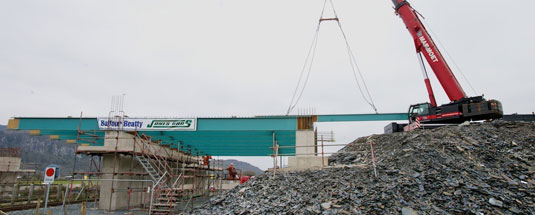 Bypass team install bridge over steam railway in time  for start of holiday season